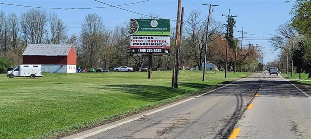 Photo of a billboard in La Rue