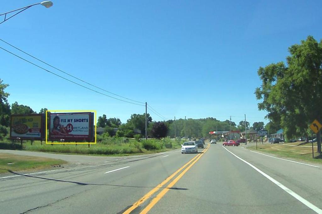 Photo of a billboard in Highland Charter Twp