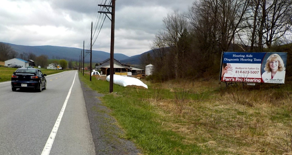 Photo of a billboard in Six Mile Run