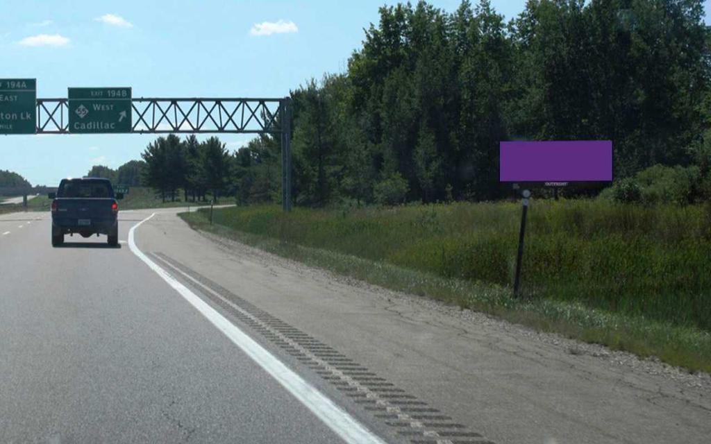 Photo of a billboard in Houghton Lake